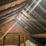 Attic insulation in London utilizing spray foam insulation.