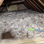 An attic filled with wool insulation, suitable for loft installations.