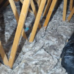 An attic with a lot of spray foam insulation.