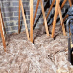 A bag of insulation in a loft.