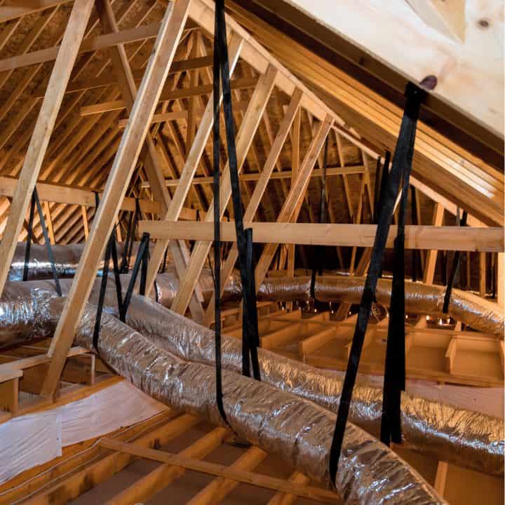 A loft space that has been cleared of rubbish