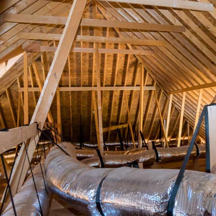 A loft space that has been cleared of rubbish