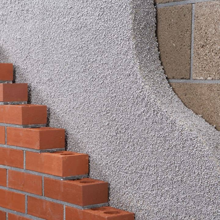Close-up of Superbead insulation installed in a wall.