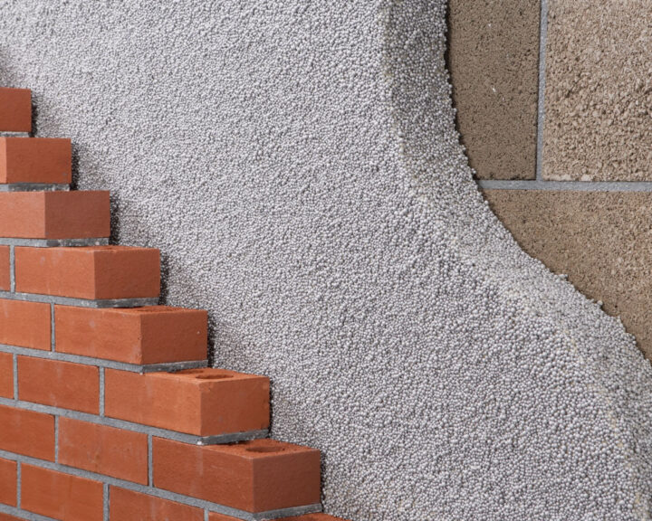 An image of a brick wall with bricks on it, suitable for loft boarding.